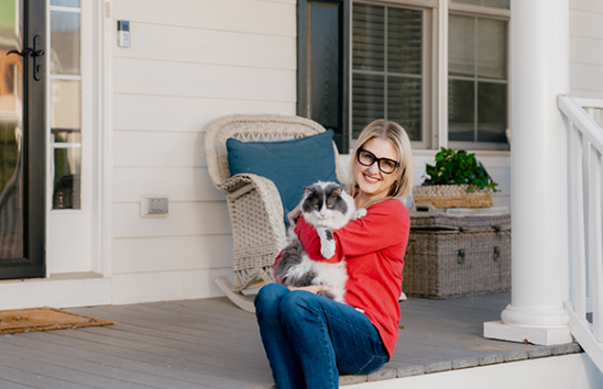 Debbie and her cat Dudley who receive pet insurance reimbursements by Direct Deposit